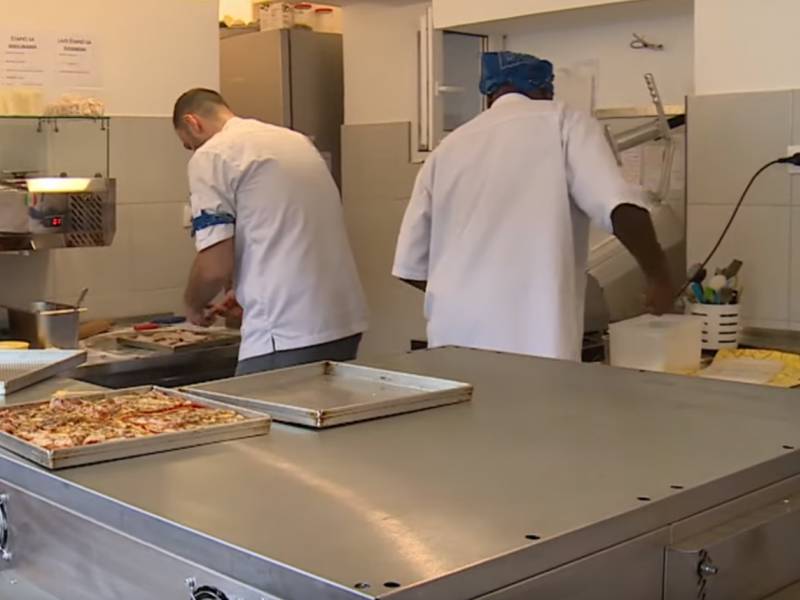 picerija koja zapošljava izbeglice i migrante